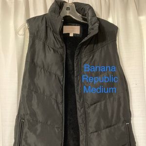 black puff vest with fur inside